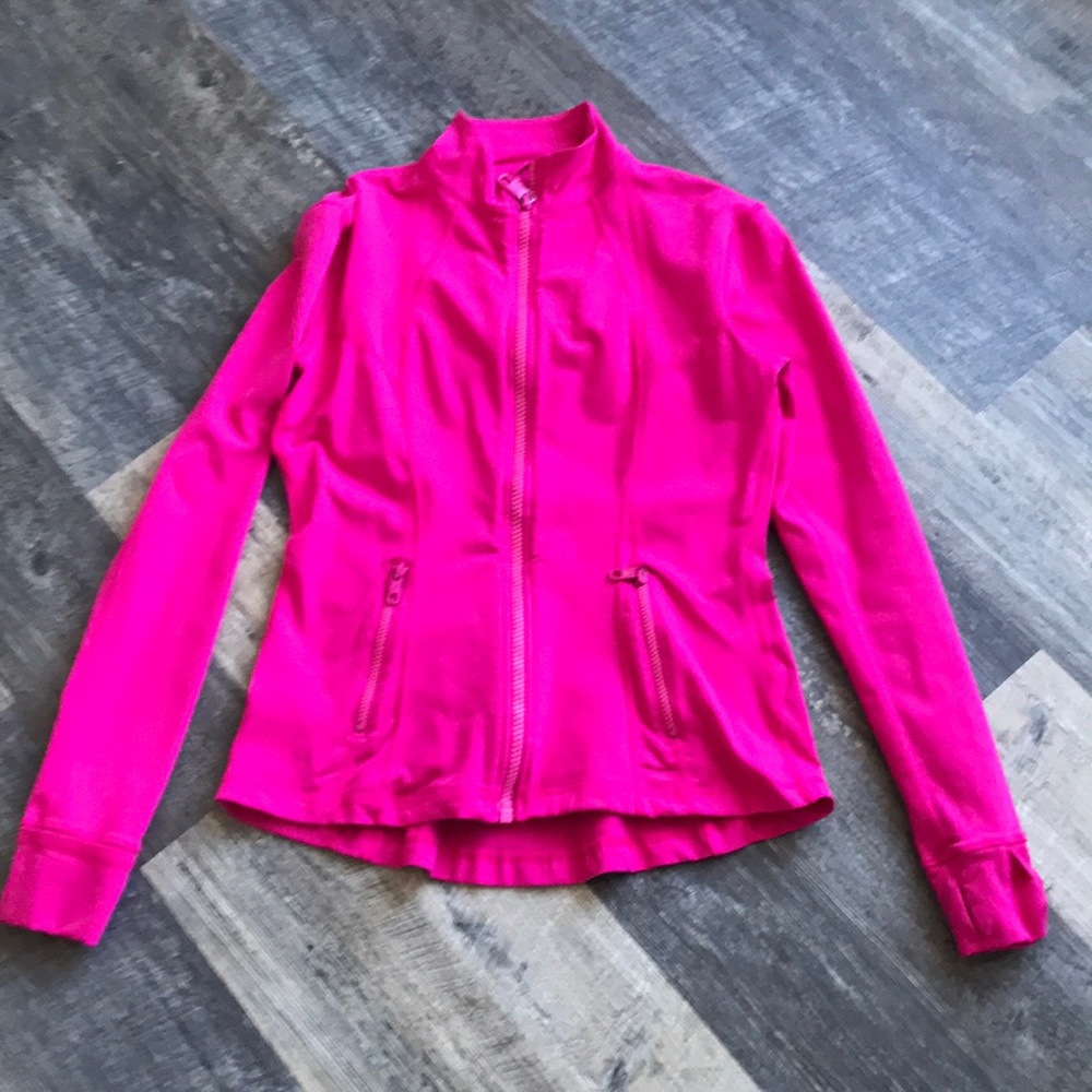 Women’s zip up running jacket.